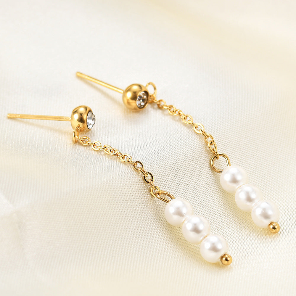 Damen Ohrhänger mit eleganten Perlen-Details und funkelndem Zirkonia Shop Nory