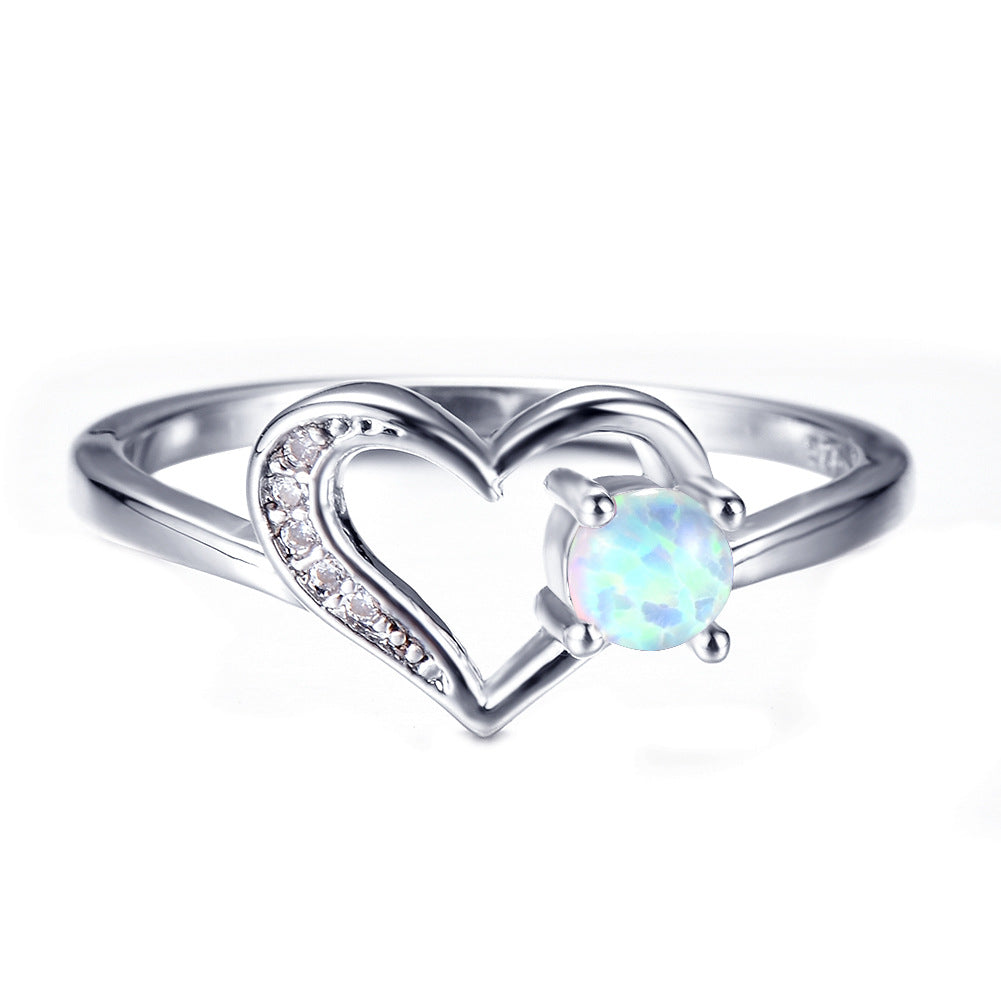 Damen Ring mit herzförmigem Design und funkelndem Opal Shop Nory