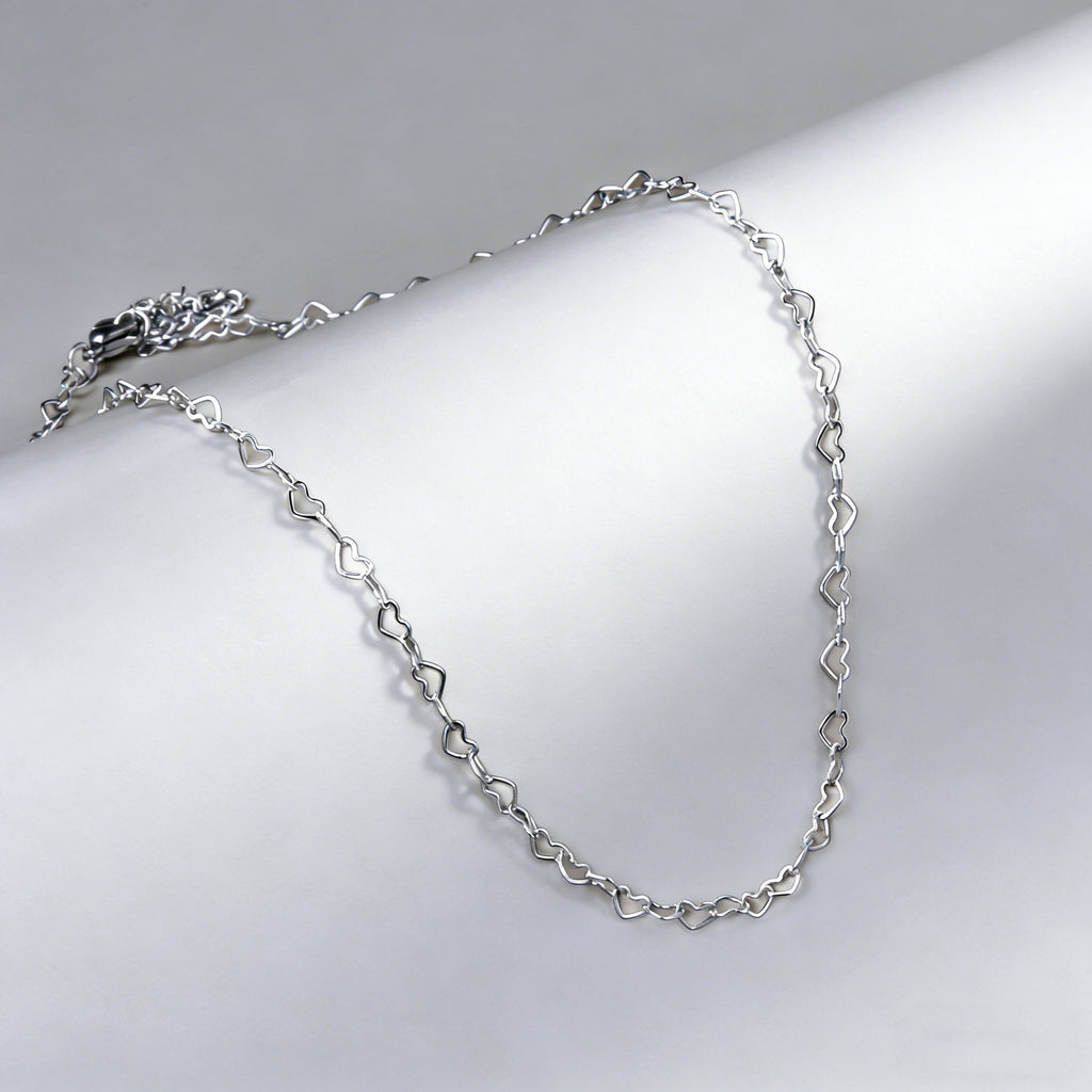 Damen Armband mit herzförmigen Gliederungen aus hochwertigem Edelstahl und goldplattierter Oberfläche Shop Nory