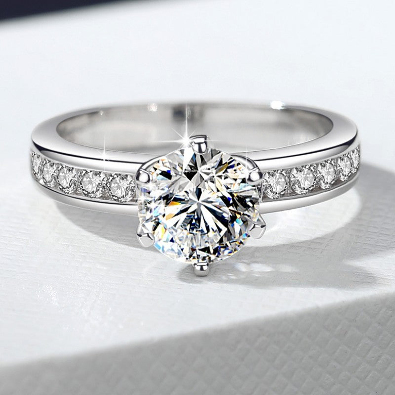 Damen-Verlobungsring mit strahlendem Hauptstein und filigranem Zirkonia-Besatz Shop Nory