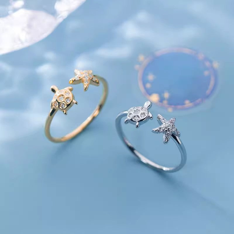 Damenring mit maritimem Schildkröten- und Sternenmotiv Shop Nory