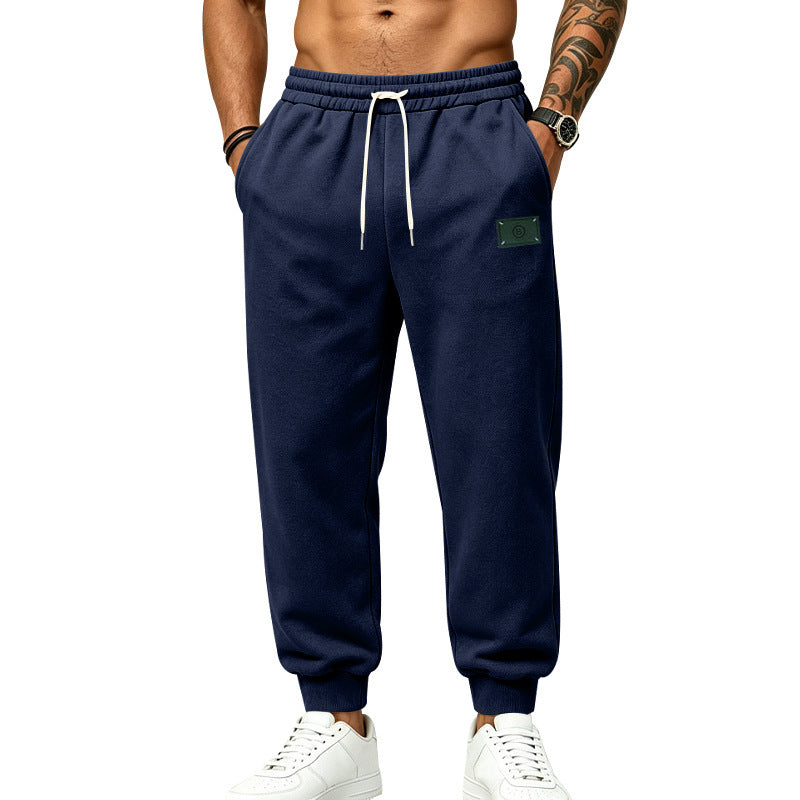Herren lässig geschnittene Sweat-Jogginghose mit elastischem Bund, Kordelzug und Bündchen Shop Nory