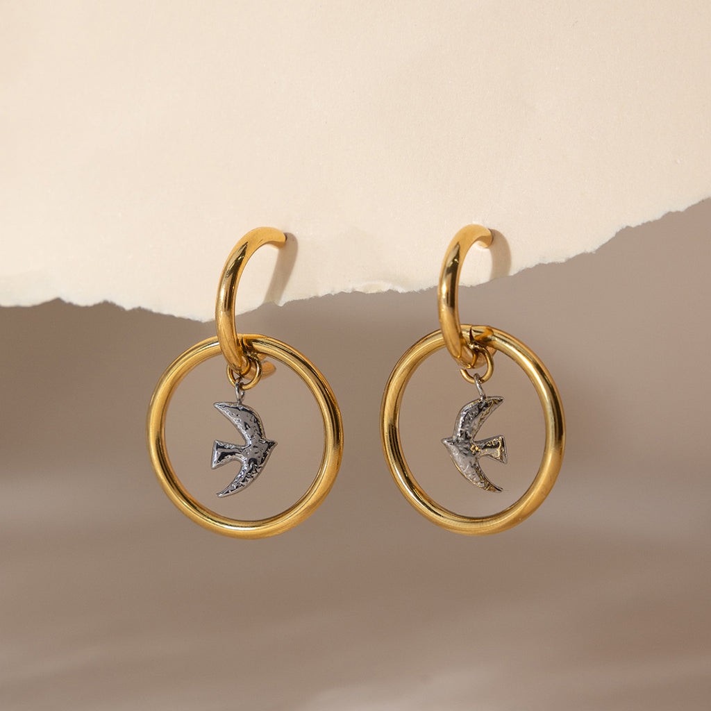 Damen Ohrhänger mit modernem Vogelmotiv und glänzendem Edelstahl Shop Nory