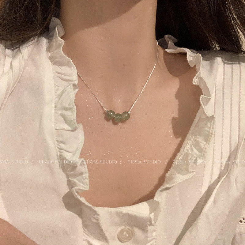 Damen Halskette mit hochwertigem Jade-Anhänger und Edelstahl-Elementen Shop Nory