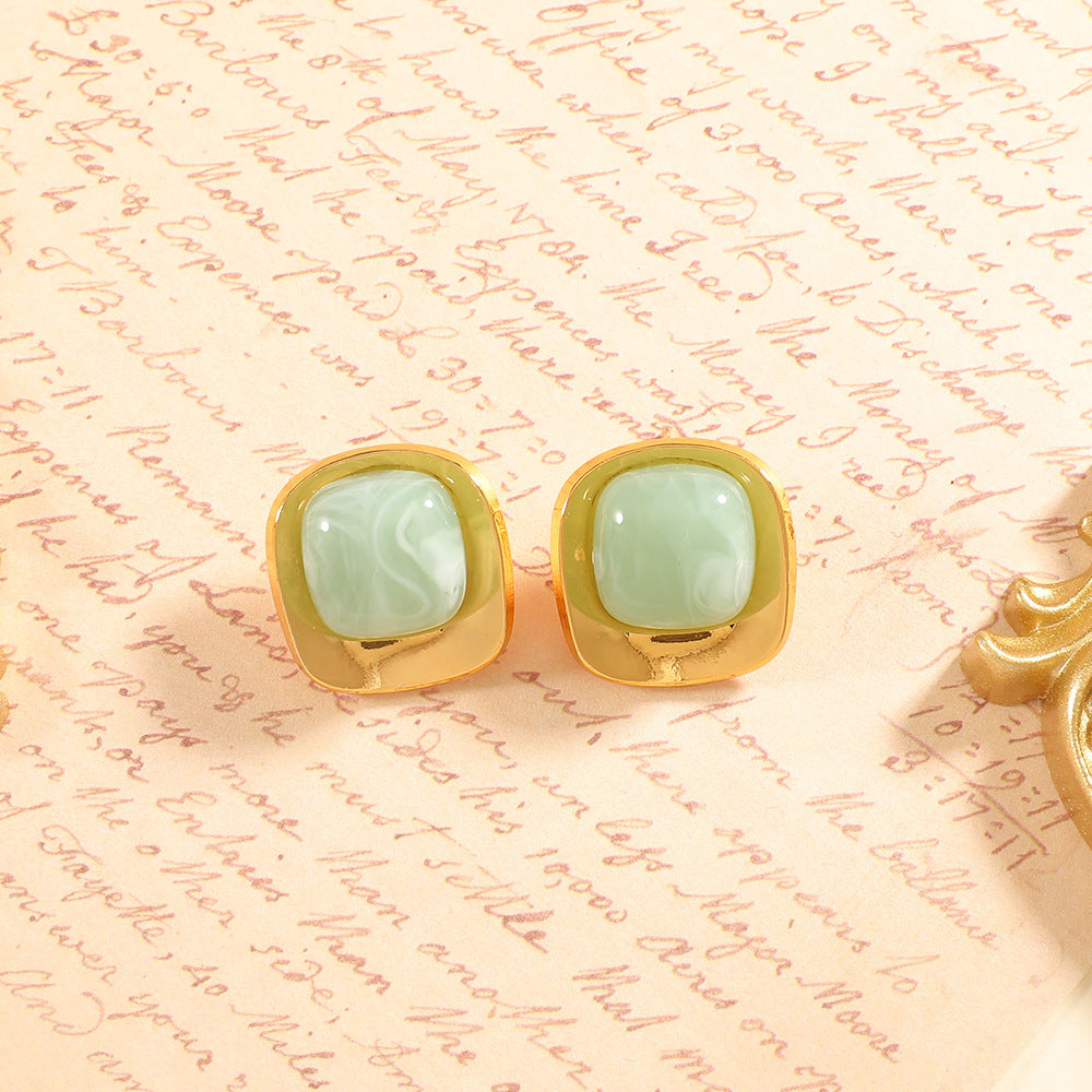 Damen Ohrstecker mit elegantem, grünem Halbedelstein und goldenem Rahmen Shop Nory