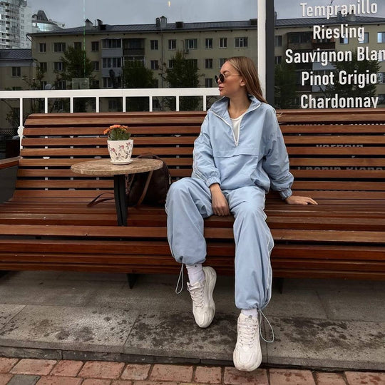 Damen winddichter Crop-Halfzip-Trainingsanzug mit elastischem Bund und kontrastierender Paspel Shop Nory