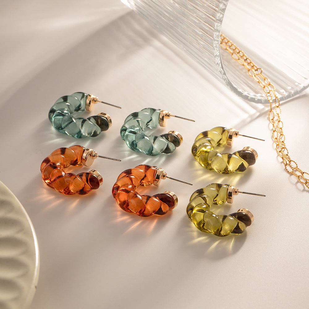 Damen Creolen aus leuchtendem Kunstharz mit elegantem Twist-Design Shop Nory