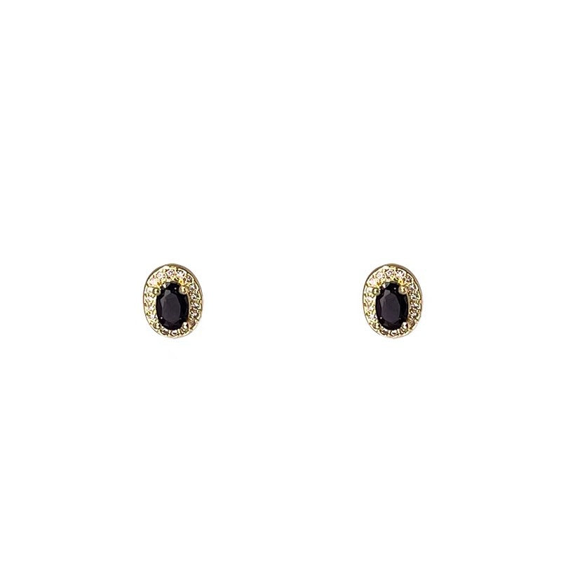 Damen Ohrstecker mit eleganten, ovalen Onyx-Details und korrespondierenden Zirkonia Akzenten Shop Nory