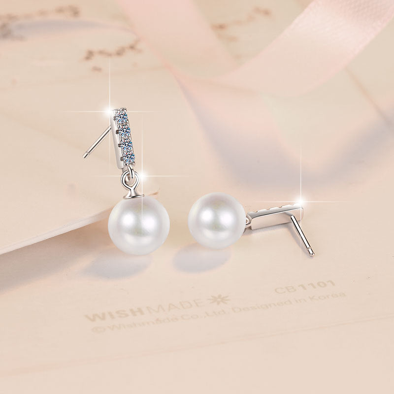 Damen Ohrstecker mit funkelndem Kristall und hochwertiger Perle Shop Nory