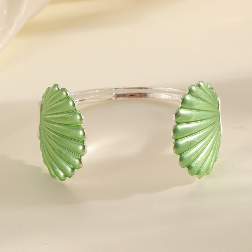 Damen Armreif mit kunstvollem Muschel-Design Shop Nory