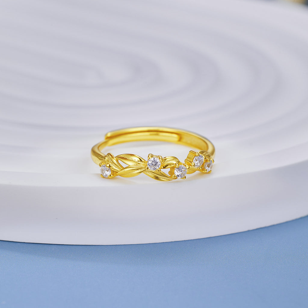 Damen eleganter Ring mit funkelnden Zirkonia und kunstvollem Blattdesign Shop Nory