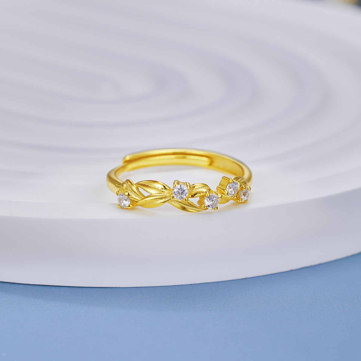Damen eleganter Ring mit funkelnden Zirkonia und kunstvollem Blattdesign Shop Nory