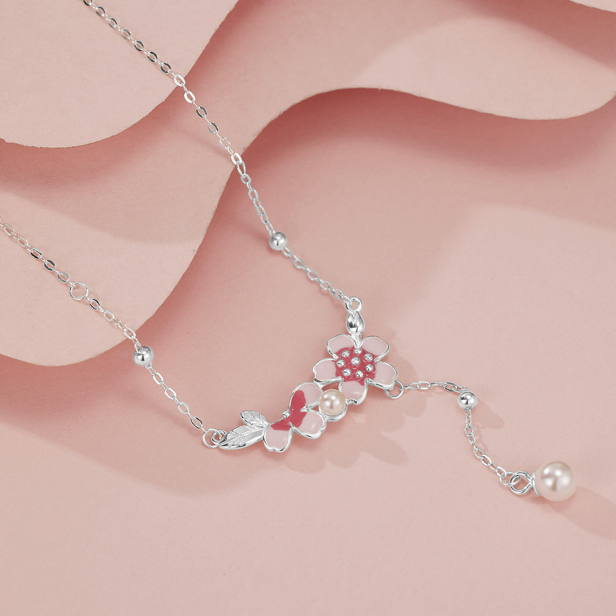 Damen filigrane Halskette mit floralen Anhängern und eleganter Perlenverzierung Shop Nory