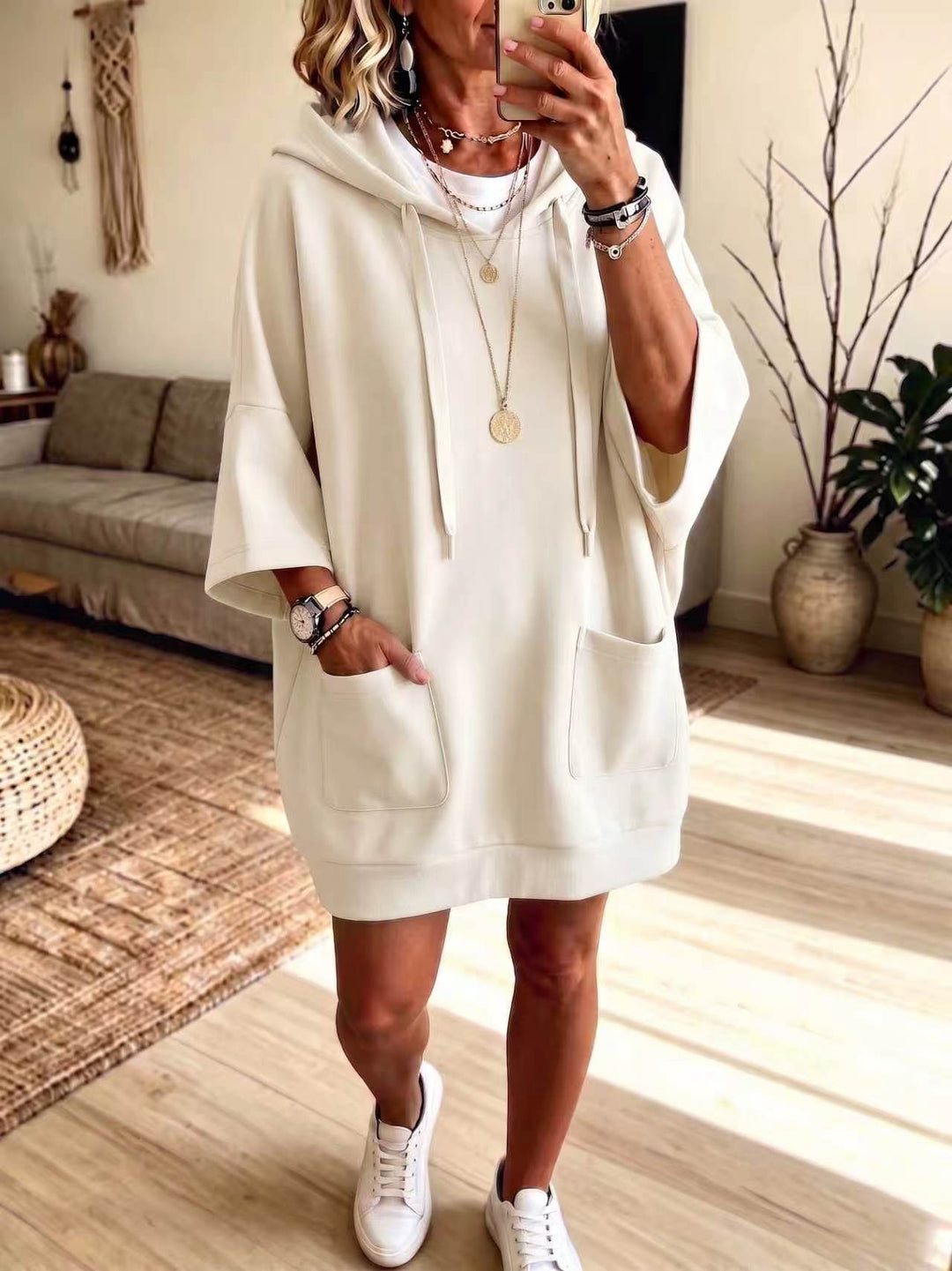 Damen Oversize Hoodie-Kleid mit Kängurutaschen und halblangen Ärmeln Shop Nory