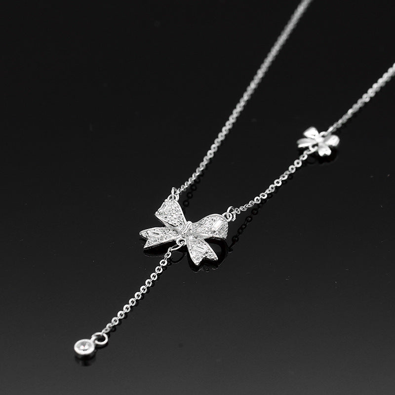 Damen Halskette mit filigranem Schmetterlingsdesign und funkelnden Zirkonia Shop Nory