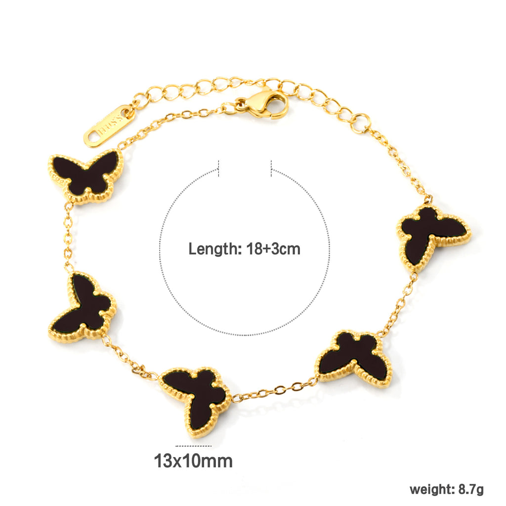 Damen Armband mit bunten Schmetterlingsanhängern und hochwertiger Goldbeschichtung Shop Nory