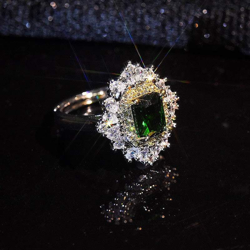 Damenring mit elegantem smaragdgrünem Edelstein und funkelnden Zirkonia-Steinen Shop Nory