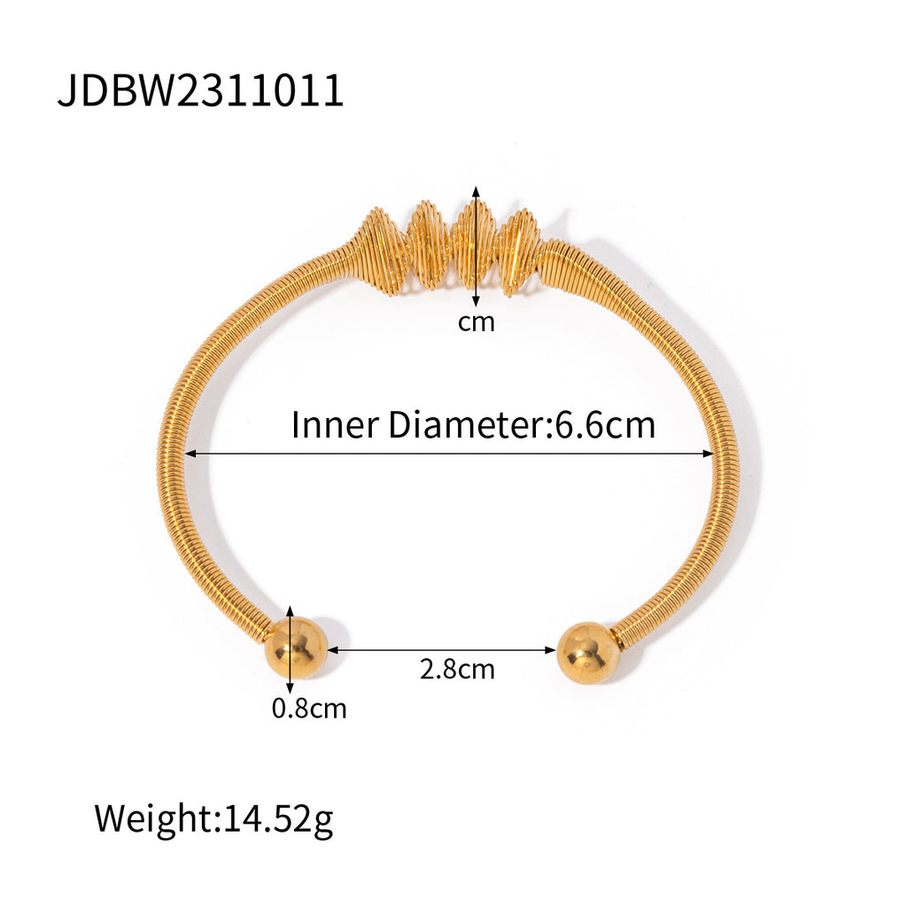 Damen Offenes Armreif mit elegantem Spiral-Design und Goldakzenten Shop Nory