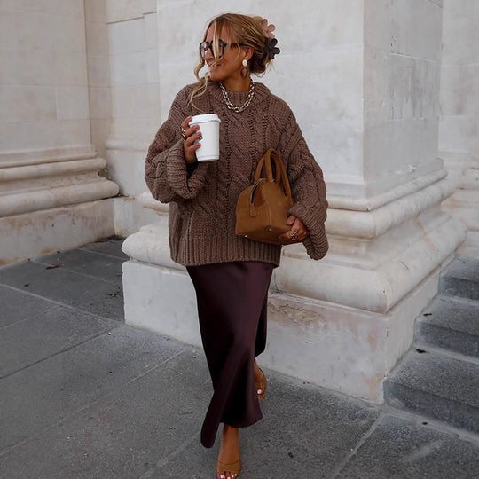 Damen Oversize Grobstrickpullover mit Zopfstrick, hohem Kragen und verlängerten Ärmeln Shop Nory