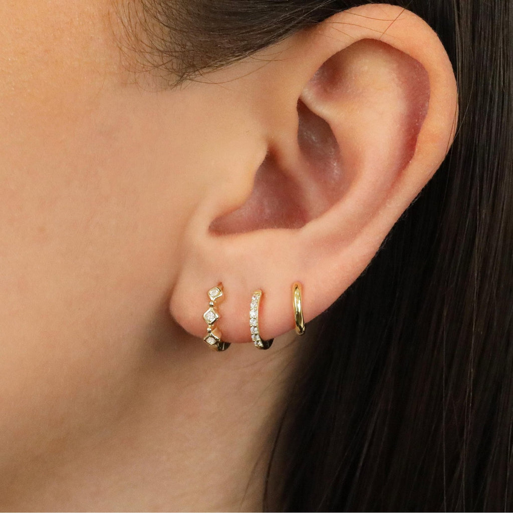 Damen Ohrstecker im eleganten Design mit funkelnden Zirkonia Shop Nory