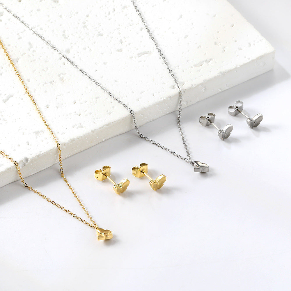 Damen Schmuckset mit stilvollem Schmetterlingsanhänger und passenden Ohrringen Shop Nory