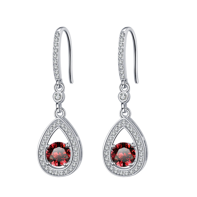 Damen Tropfenohrringe mit funkelnden Zirkoniasteinen und eleganter Fassung Shop Nory