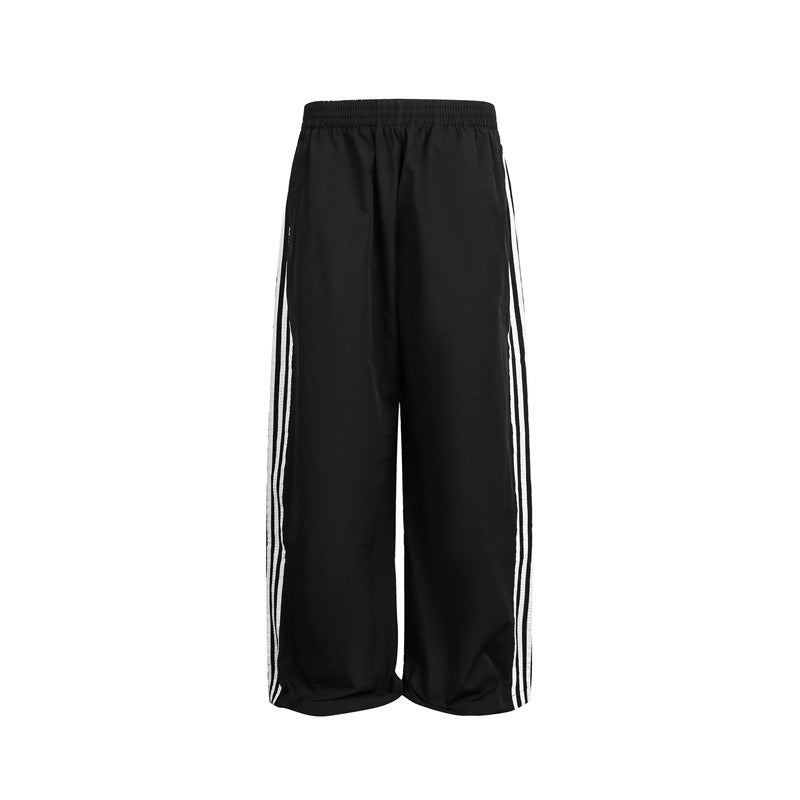 Damen weite Satin-Trainingshose mit elastischem Bund und seitlichen Kontraststreifen Shop Nory