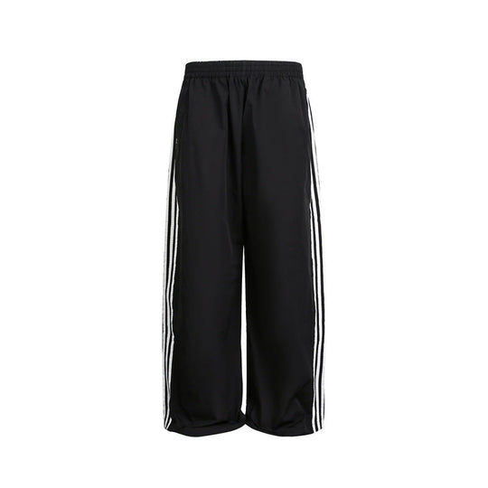 Damen weite Satin-Trainingshose mit elastischem Bund und seitlichen Kontraststreifen Shop Nory