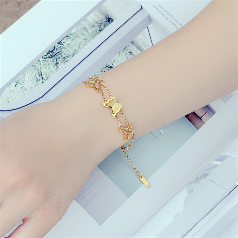 Damen Armreif mit filigranem Schmetterlingsdesign aus hochwertigem Edelstahl Shop Nory