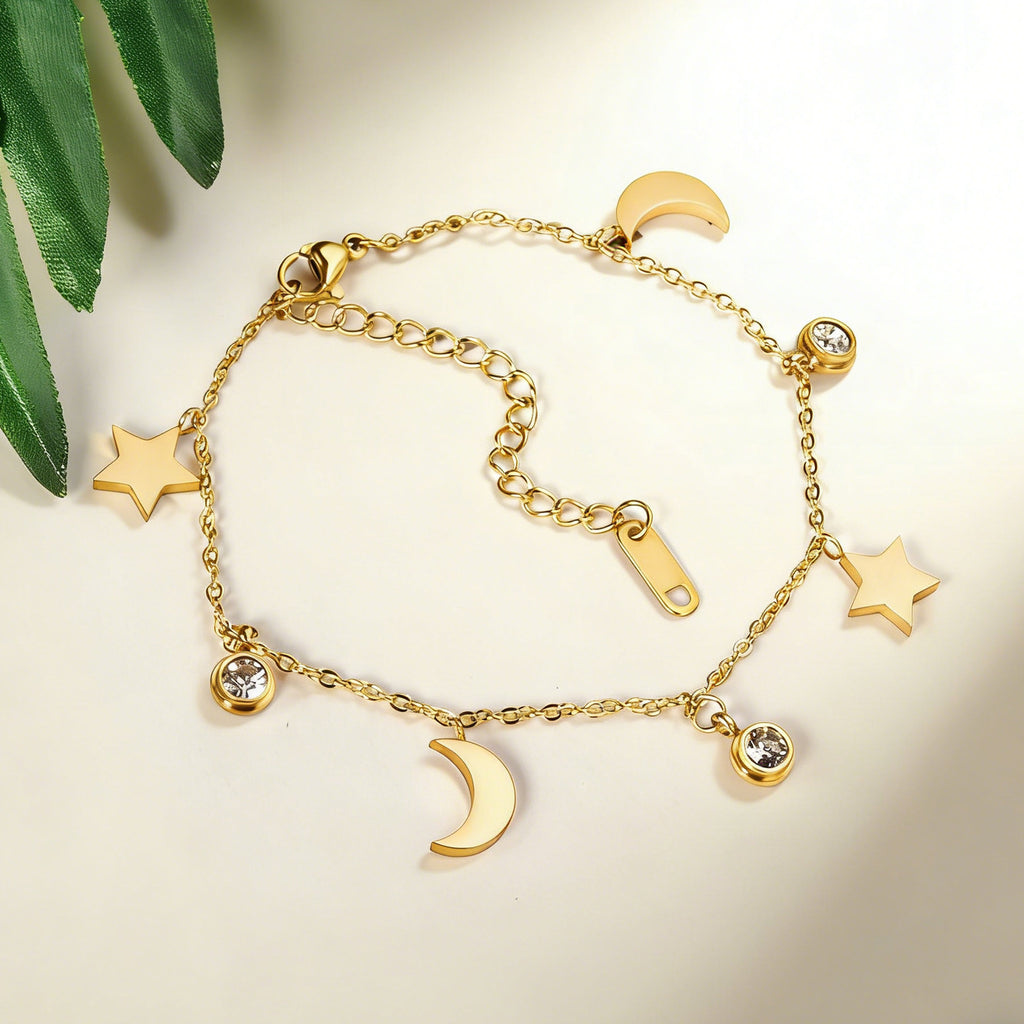 Damen Armband aus rosévergoldetem Edelstahl mit funkelnden Anhängern Shop Nory