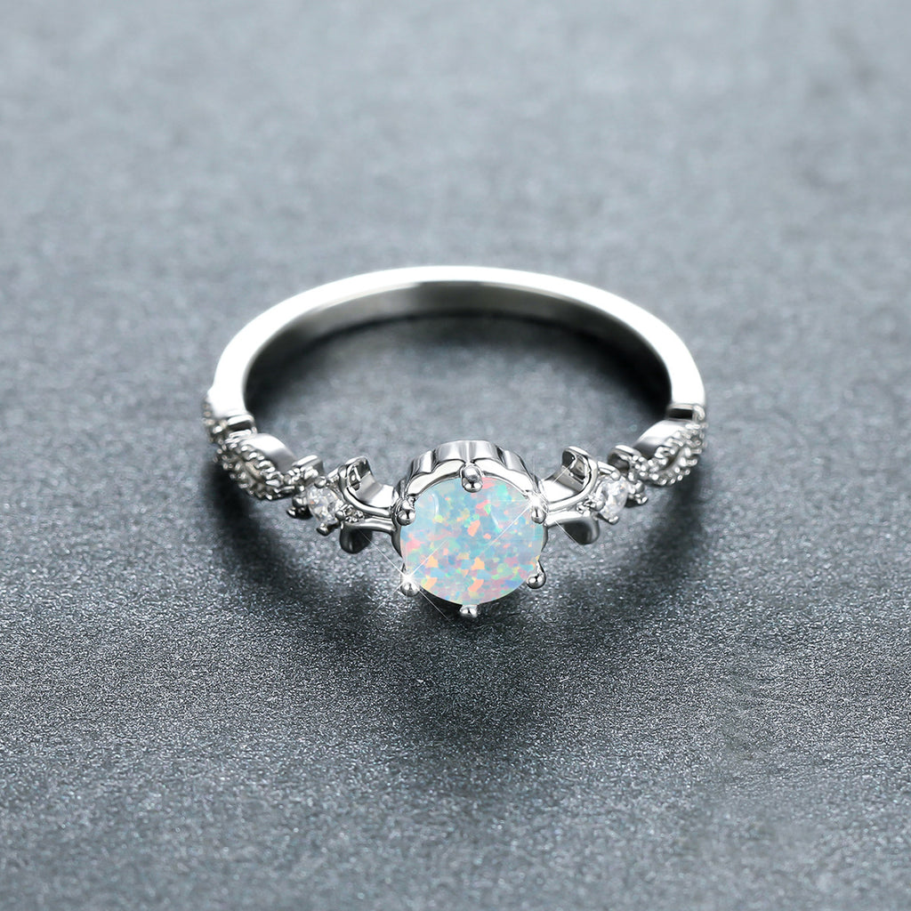 Damen Schmuckring mit opalisiertem Stein und filigranem Design Shop Nory