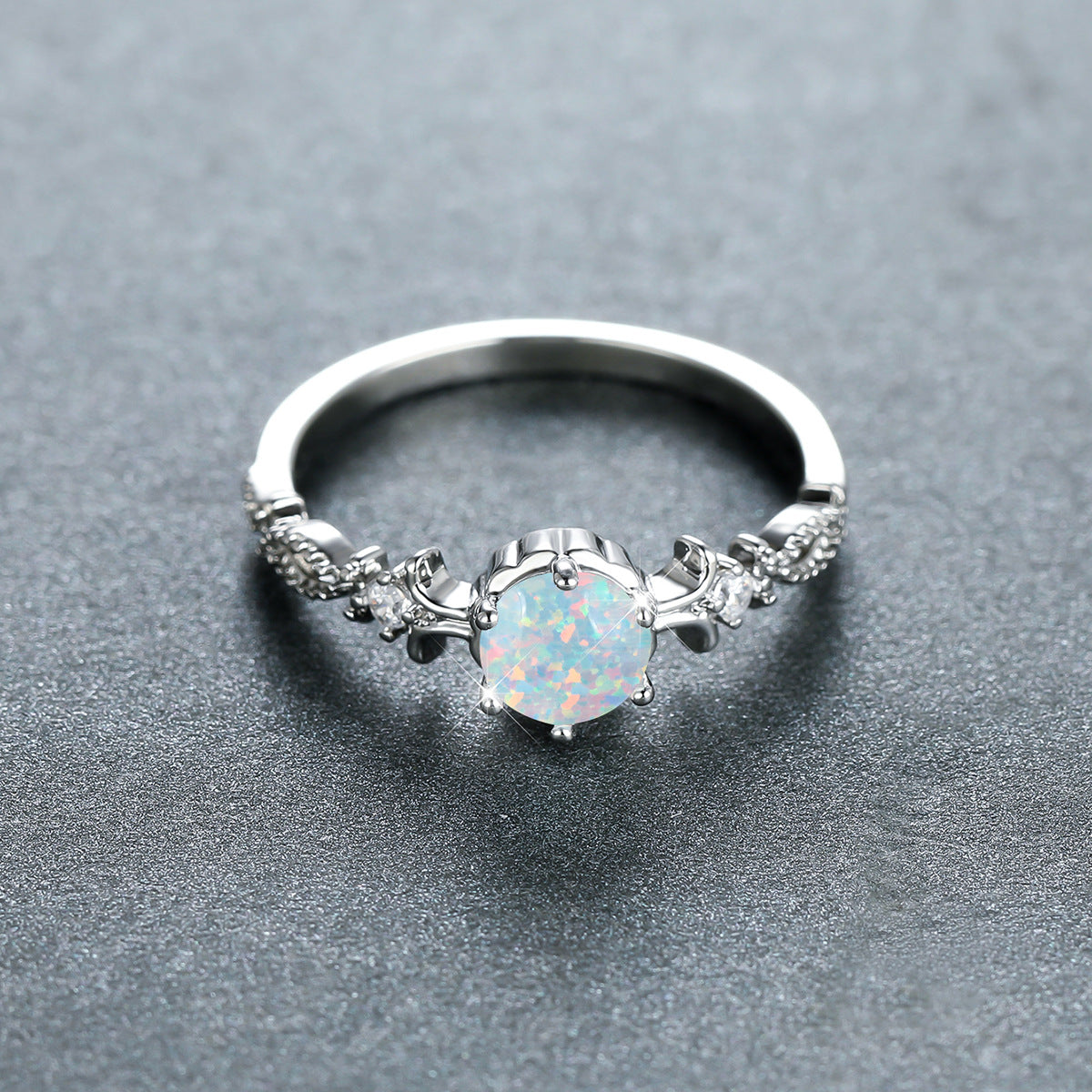 Damen Schmuckring mit opalisiertem Stein und filigranem Design Shop Nory