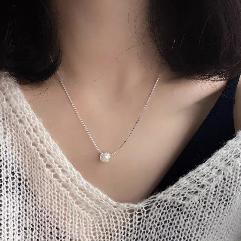 Damen Halskette mit zeitlosem Perlenanhänger und elegantem Silberminimalismus Shop Nory