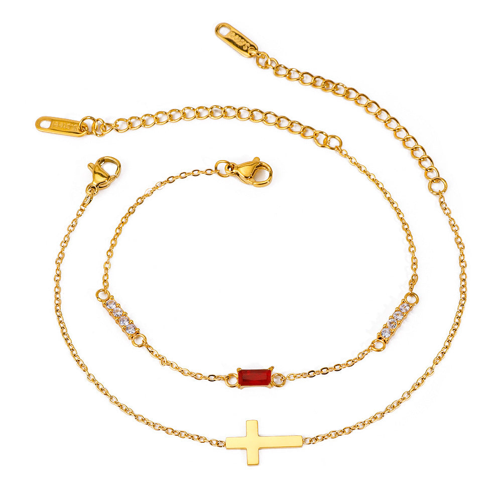 Damen Doppelarmband mit funkelnden Zirkonia und Kreuzanhänger Shop Nory