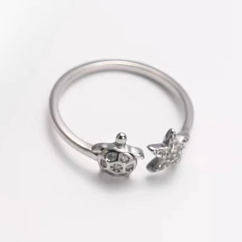 Damenring mit maritimem Schildkröten- und Sternenmotiv Shop Nory