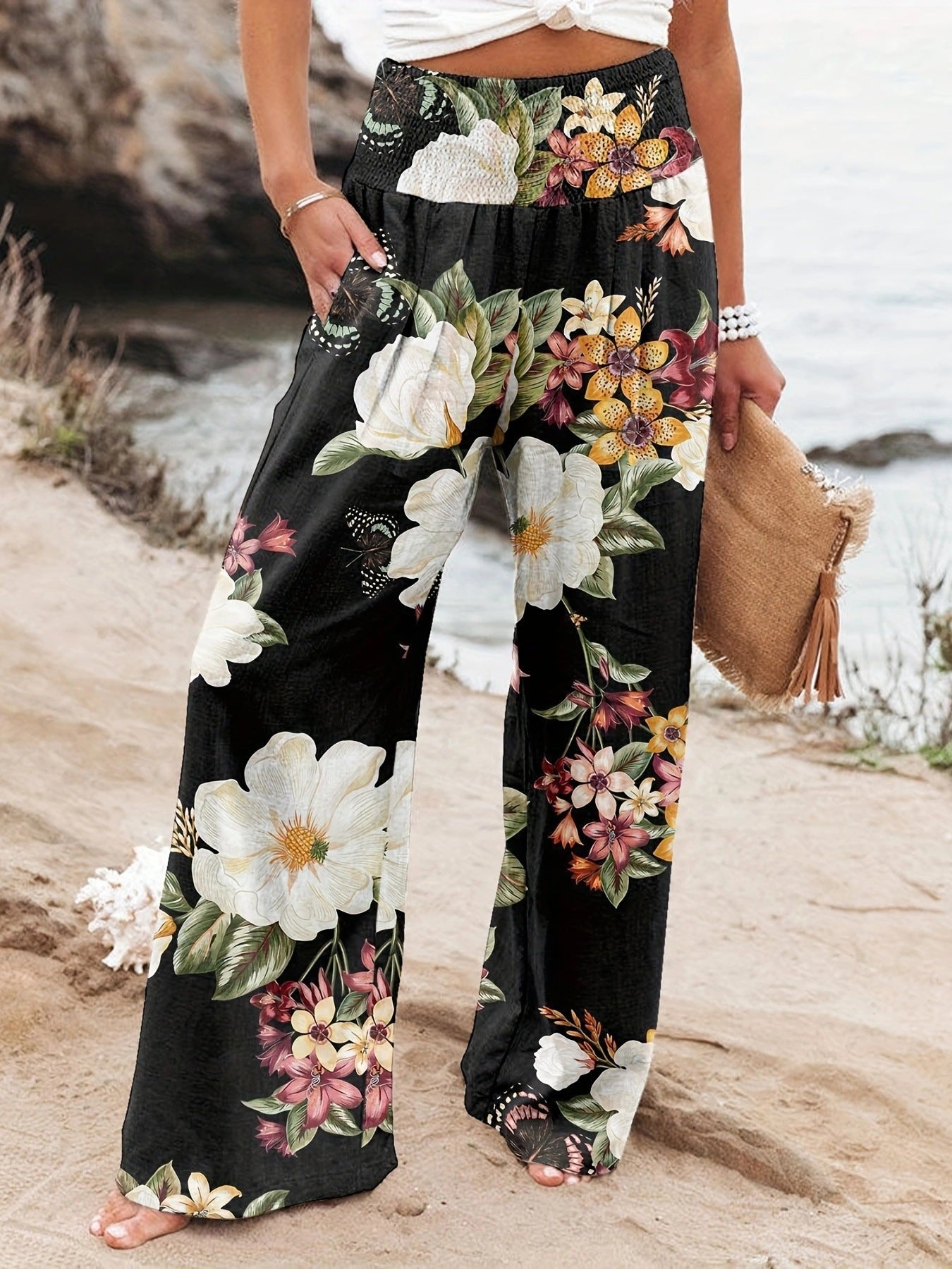 Damen Weit geschnittene Strandhose mit floralem Motiven und elastischem Bund