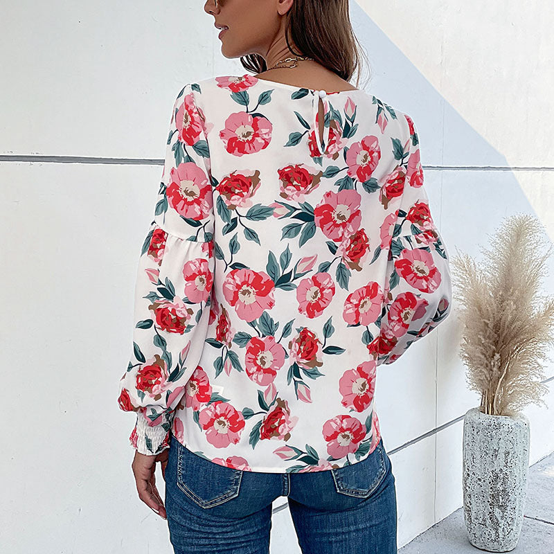 Damen Leichte Bluse mit großflächigem Blumenprint, Volumenärmeln und Smokbündchen Shop Nory