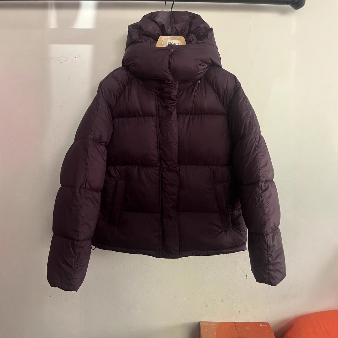 Damen Kurz geschnittene Oversize-Steppjacke mit hohem Kragen und Kapuze Shop Nory