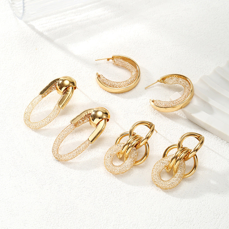 Damen Hängende Ohrringe mit innovativem, goldfarbenem Design Shop Nory