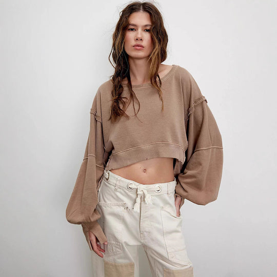 Damen cropped Oversize-Sweatshirt mit Daumenloch, fransigem Saum und weitem Raglanärmel Shop Nory