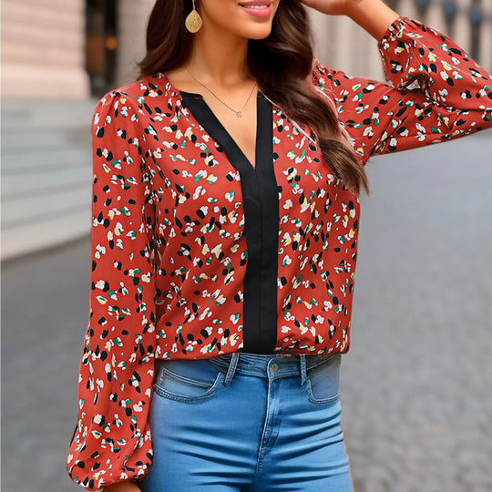 Damen Locker geschnittene V-Ausschnitt-Bluse mit kontrastierter Zierblende und Allover-Print Shop Nory
