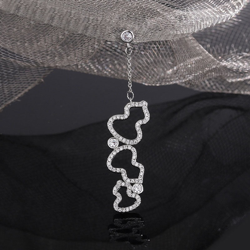 Damen Ohrringe mit kunstvollem Design und funkelndem Zirkonia Shop Nory