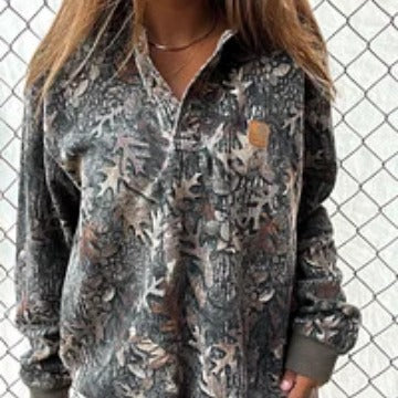 Damen gemusterter Fleece-Pullover mit kurzem Reißverschluss, Polo-Kragen und gerippten Bündchen Shop Nory