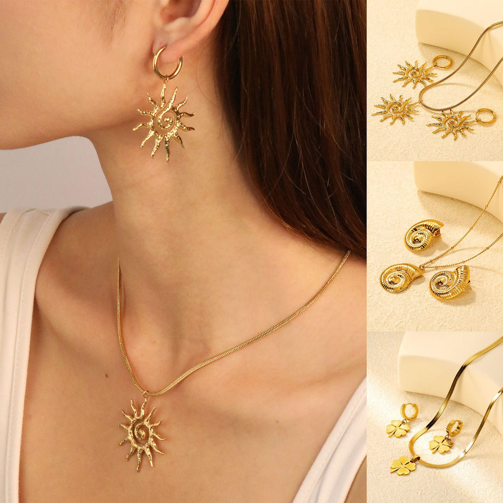 Damen Schmuckset mit vierblättrigem Kleeblatt-Anhänger und passenden Ohrsteckern Shop Nory