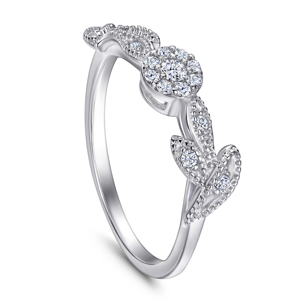Damen Ring mit floralen Elementen und funkelndem Zirkonia-Besatz Shop Nory