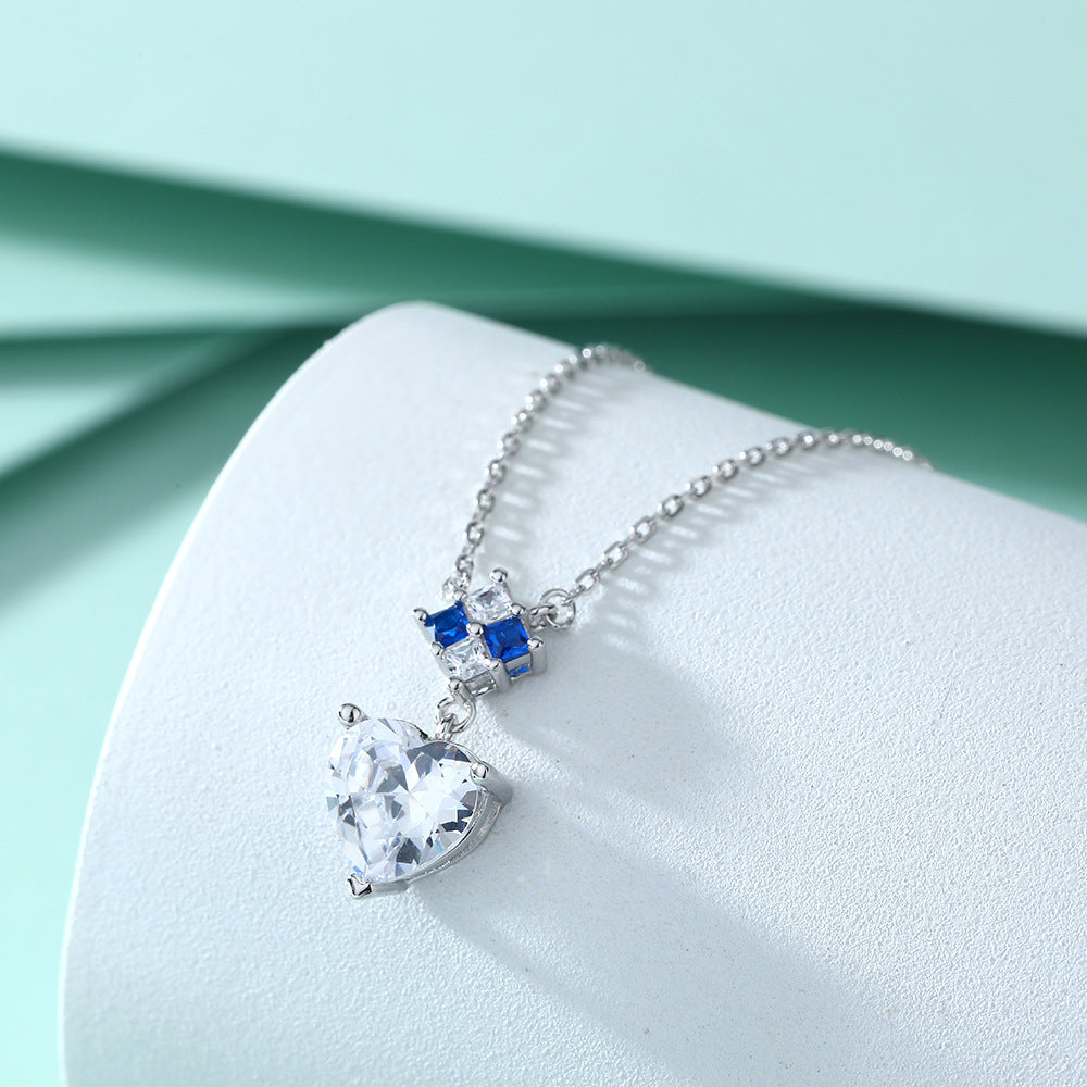 Damen Halskette mit herzförmigem Anhänger und funkelnden Zirkonia-Elementen Shop Nory