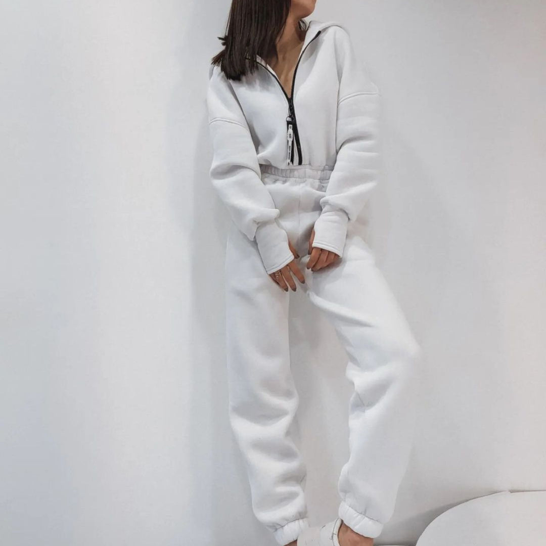 Damen taillierter Kapuzen-Jumpsuit mit elastischem Bund und markanten Kontrast-Reißverschlüssen Shop Nory