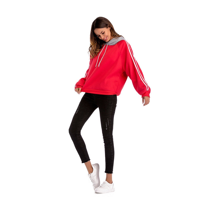 Damen modischer Kapuzenpullover mit kontrastierenden Ärmeln und lässigem Schnitt Shopnory