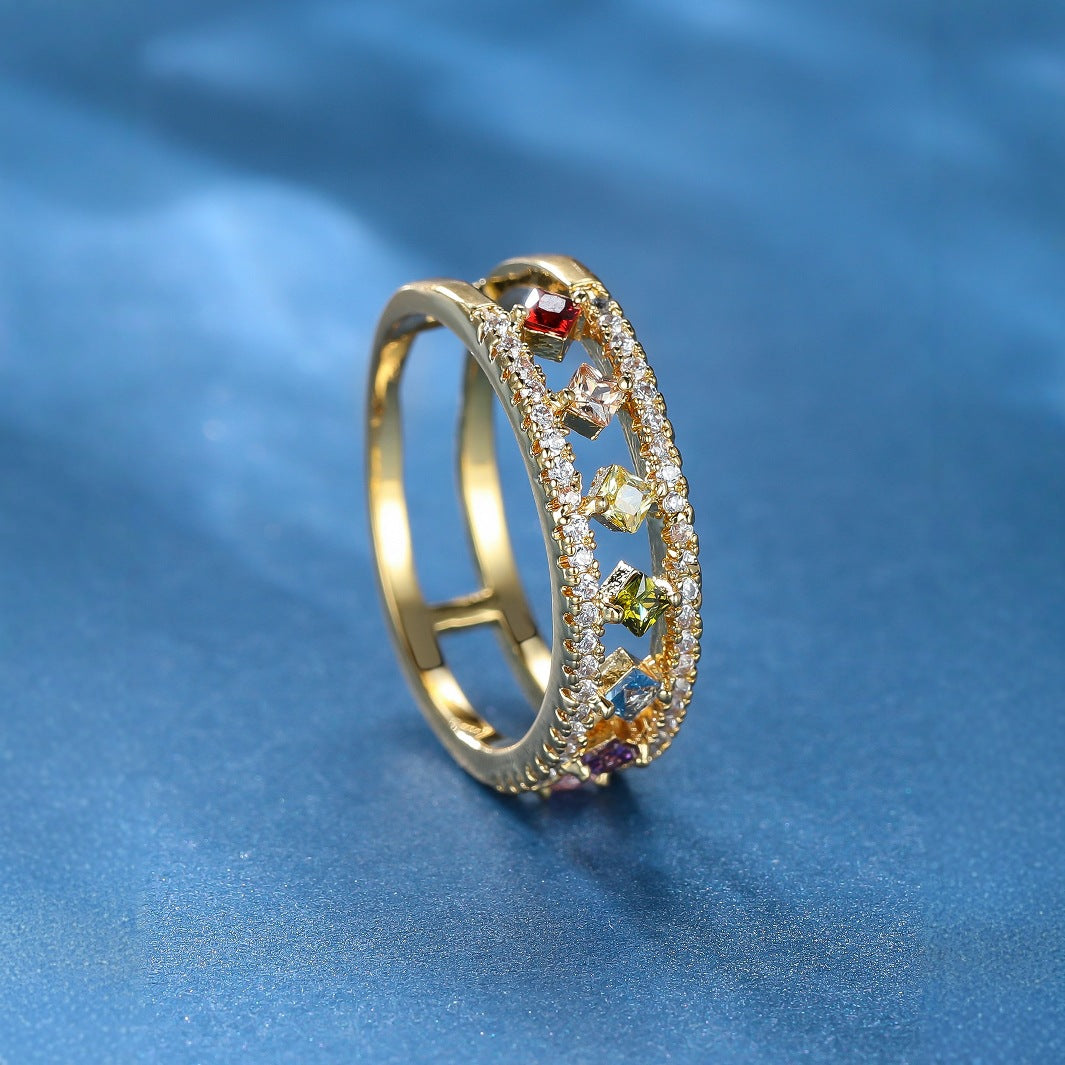 Damen Ring mit funkelnden, farbigen Zirkonia und eleganter Goldfassung Shop Nory