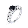 Damen eleganter Ring mit schwarz gefasstem Hauptstein und floralen Verzierungen Shop Nory